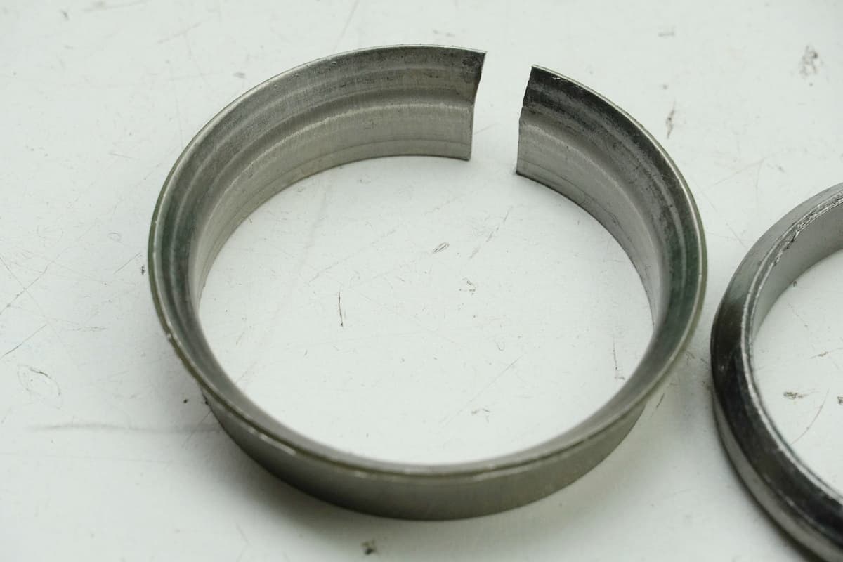 originale Auspuffschelle + Dichtung + Anschlagring - zur Verbindung Endschalldämpfer mit Krümmer (Sammler)