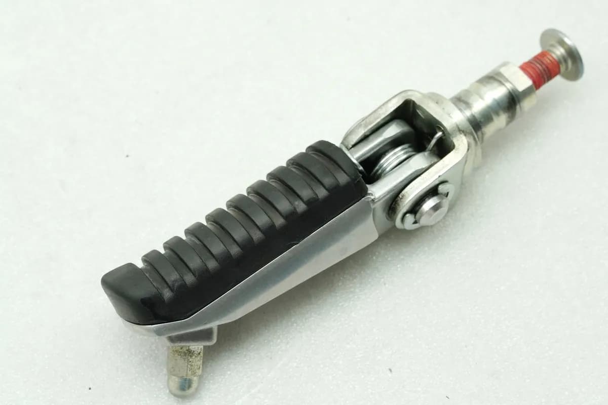 KAWASAKI Z 750 ZR750J Fußraste Fahrer links vorn original Halter Gelenk 04-06