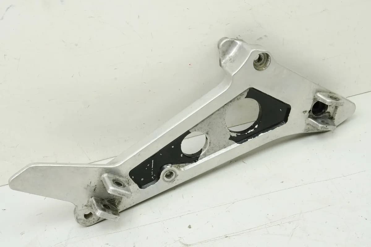 HONDA NTV 650 RC33 REVERE Fußrastenplatte Fahrer rechts Halter Fußraste Träger