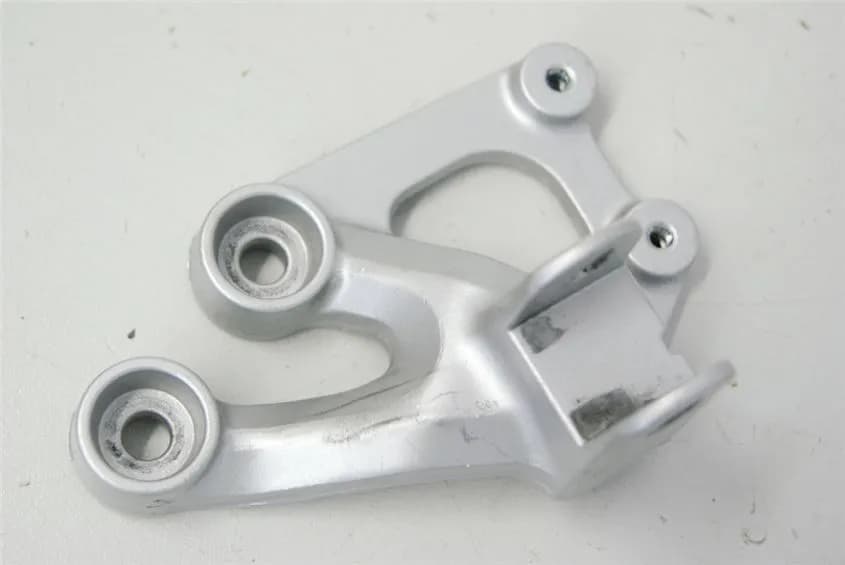 SUZUKI GSX-R 750 WVCW FUßRASTENTRÄGER FAHRER LINKS FOOTREST