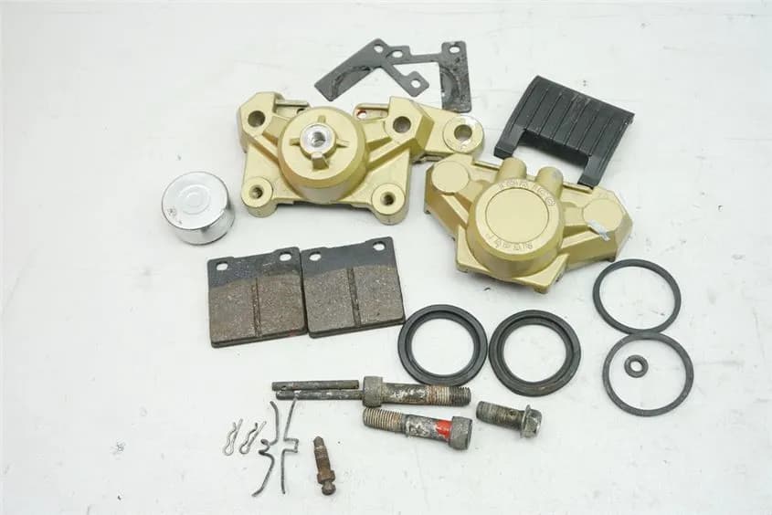 SUZUKI GSXF 600 GN72AB BREMSSATTEL HINTEN BRAKE CALIPER TOKICO GOLD