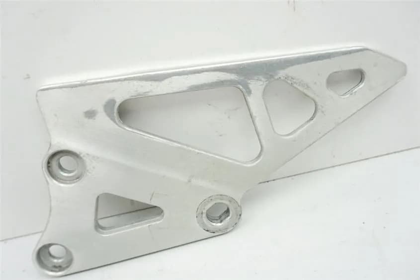 SUZUKI GSX-R 750 GR77B - FUßRASTENTRÄGER FAHRER LINKS HALTER FUßRASTE 88-89