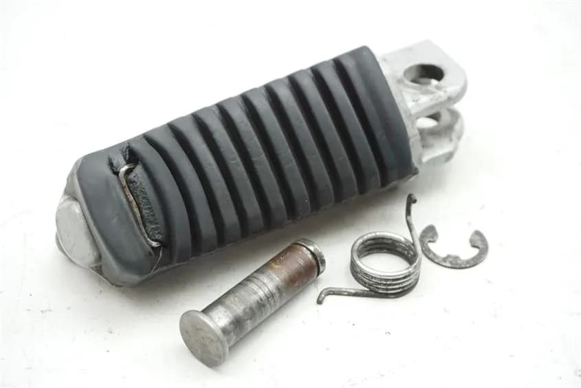 KAWASAKI GPZ 600 R NINJA ZX600A FUßRASTE FAHRER LINKS FOOTREST
