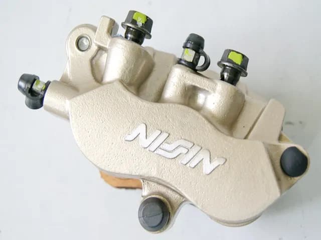 HONDA VFR 800 RC46 CVTEC Bremssattel links Nissin Bremszange Bremskolben 02-07