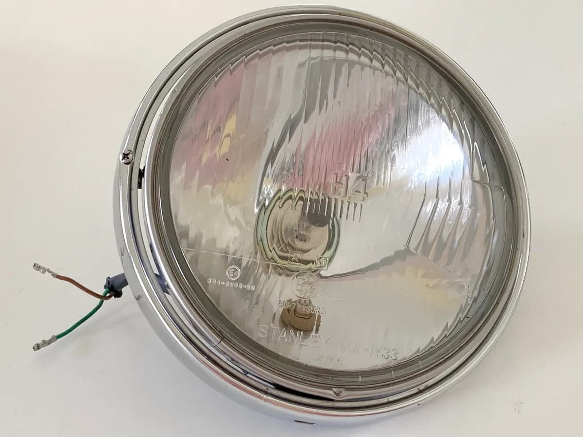 HONDA NTV 650 RC33 REVERE Scheinwerfer Einsatz original Lampe Blende Lampenring