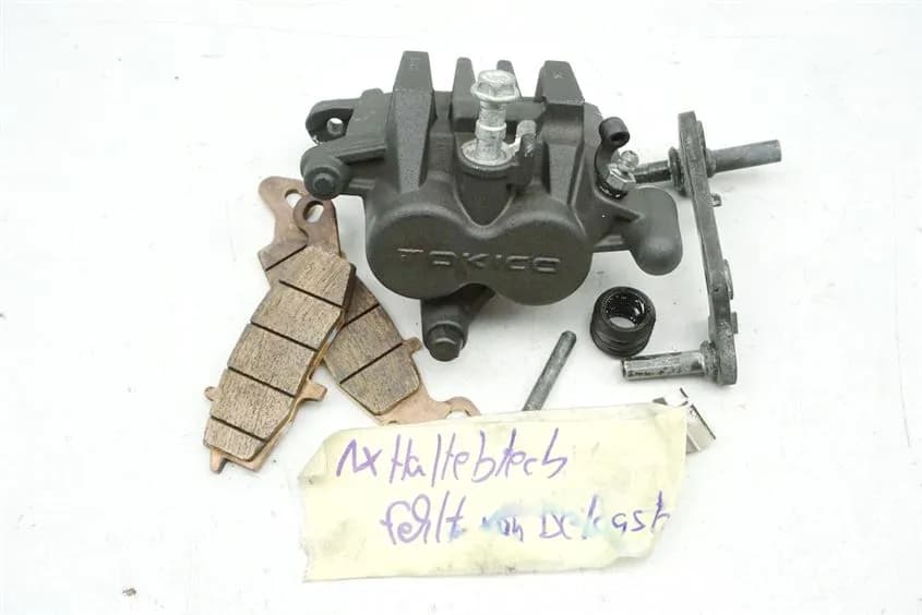 KAWASAKI ER-6 N ABS ER650E BREMSSATTEL RECHTS BRAKE CALIPER BREMSKLÖTZE - 8600 KM