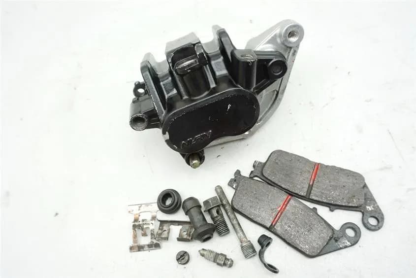 HONDA CBR 1000 SC24 BREMSSATTEL RECHTS ANKERPLATTE BRAKE CALIPER