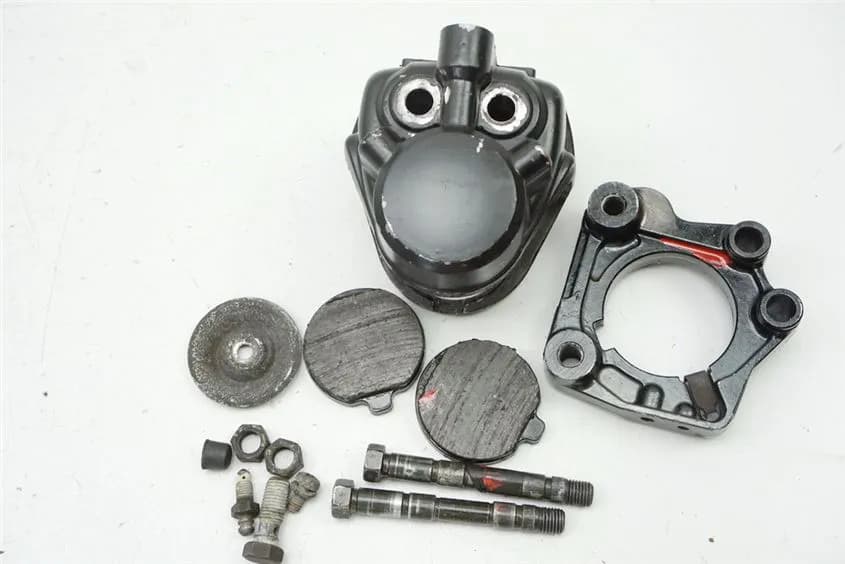 KAWASAKI Z 1000 ST KZT00E Bremssattel links Bremszange Bremskolben